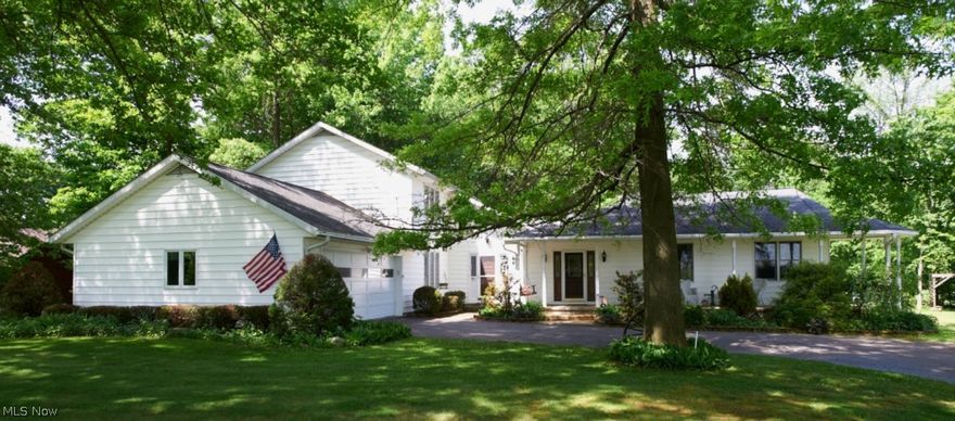 This is a GREAT home with CRAZY potential!  The former home business location of Woodland Studios Photography.  This home has 4 bedrooms and 2 1/2 baths, 2-3 family rooms including a Great Room with Cathedral ceiling, a bonus room currently used as a music room, a first floor laundry, a potential "In-law suite" with exterior entrance, a 2 car attached garage, and a HUGE 40x36 shop with large overhead door.  There's so much to like from the spacious home, to the shop, to the nice woods, that you'll have a hard time deciding where to spend your time!