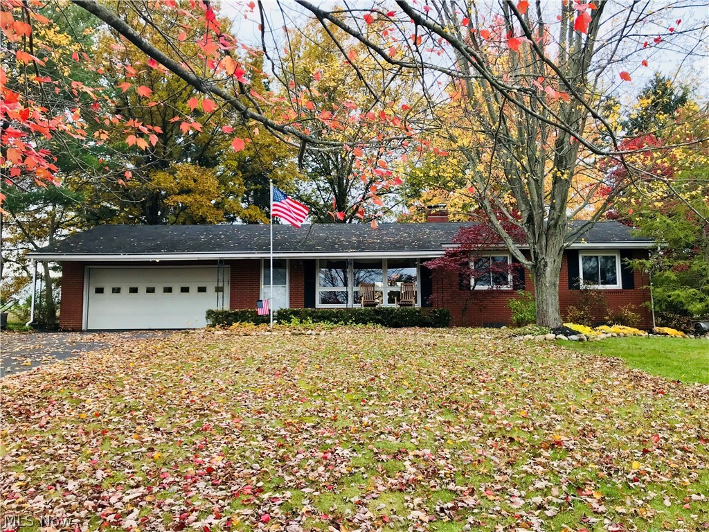 This well-cared for, all brick home has a scenic country-like setting to be viewed from the covered patio and sunroom area. In addition to the three bedrooms, two bathrooms and hardwood floors on the main level, the basement is partially finished and offers a gas fireplace for a cozy family room area. Location offers convenience to major interstate and access to shopping. All of this and a one-year home warranty for the buyer. Come see it for yourself.