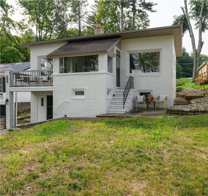 Welcome to your new home at 158 Oak Dr NW in the private Willowdale Lake community in the Jackson Local School System! Turn-key modern-chic cottage has it all! Entertain in the open concept kitchen. The kitchen boasts SS appliances, lg island to gather with friends a huge picture window with full lake view & an area for a more formal kitchen table. Take guests into the large liv rm & cozy up to watch sunrise through the lg picture window or step out into the cutest foyer & walk out to your balcony to enjoy natures sounds & a full view of the lake. Look close & you'll spot our resident blue herons! Out back is a firepit area to enjoy on those cooler evenings. The oversized, detached garage already comes equipped w/2 kayaks for like life living! There is also an attached very large pavilion for lovely gatherings. Down the staircase from the kitchen, you'll enjoy a very chic area for an office or craft space. There is a master bdrm, a 2nd bdrm, gorgeous full bath & a lg laundry rm! There