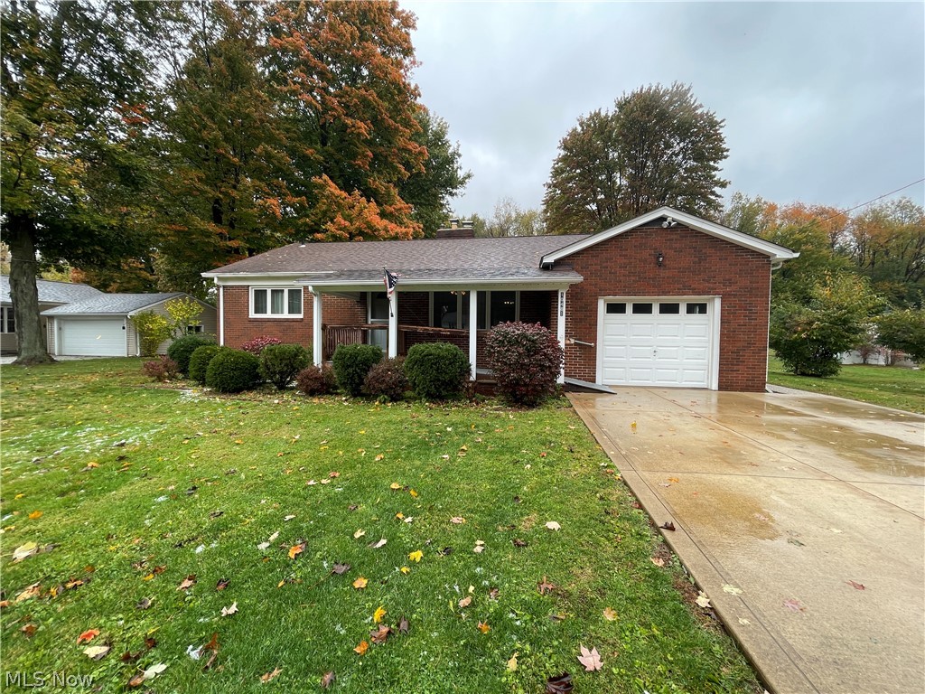 If you have been waiting for a ranch with a basement, look no further! This Concord Township ranch home is waiting for your personal touches. Upon entry, the large living room with wood burning fireplace, greets you with an open concept into the dining space and kitchen. It also offers much living space and access to the hallway to the bedrooms. The three bedrooms all have hardwood floors under carpet, lighted closets, overhead lighting and updated windows. The dining space boasts views of the large back yard and has access to the kitchen and half bath. In the lower level, you will find a large recreation room with another wood burning fireplace, plenty of storage, the laundry room with appliances and access to the backyard. Don't miss the attic storage above the one car attached garage. If you are looking for an outbuilding, this home has it! It also has a custom paver patio and shed. The front ramp is perfect for anyone but can be removed easily if needed. Don't miss your