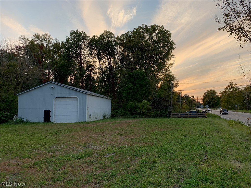 40'x60' Commercial Warehouse/Mechanics Garage, 1.13 acre parcel with 208' of frontage on US RT 20 (North Ridge Rd). Located in Geneva Township just west of Geneva City limits. Prime location with high traffic count, high visibility, centralized location in close proximity to regions population centers and commercial routes. New steel roof, exterior in good condition, interior is in perfect shape. Features include: New commercial natural gas furnace, 6" concrete floor, high output warehouse lighting, auto lift, compressor, overhead door. Electric, water and gas to garage. Bring offers today.