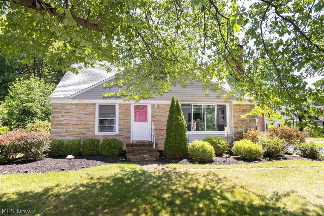Get a Move On! Start your summer in this well-appointed Cape Cod Strongsville home! Greet your guests (plenty of parking, by the way!) in the well lit living room with fireplace. Entertain the night away in the updated kitchen with full appliance package. Spend the mornings with coffee or tea on the sun porch! The carpeted second floor is the Owner's oasis! Don't miss the half bath! Hardwood floors found throughout the home! The lower level is partially finished and just awaits your touches! Be the host with the most on your nearly full acre lot with fire pit! Wooded and private partially fenced rear yard with a detached two car garage gives you room to grow! Easy access to I-71, Ohio Turnpike, Metroparks, shopping and all things CLE! Look no further - Call Today!!