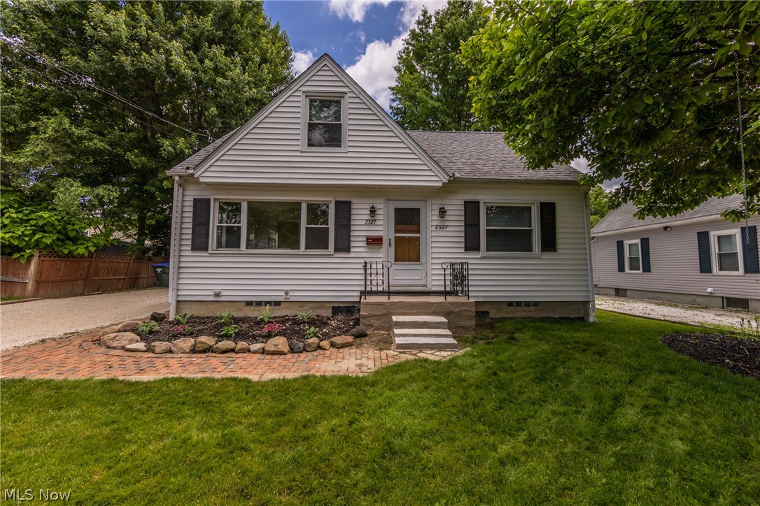 Welcome to this darling cape cod in the heart of Cuyahoga Falls! The living has two large windows to shine natural light in on those beautiful hardwood floors. Off the living room is the dining area that has two windows and opens into the kitchen, the perfect entertaining spot in the home! This lovely kitchen has plenty of cupboard space to store all your kitchen gadgets. Two nicely size bedrooms on the main floor with an all updated bathroom. A nice sized bedroom upstairs or this could make a great office space. Close to Front Street, State Road, many restaurants, shops and attractions close by!