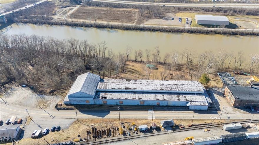 828 Depot Street is a 61,452 SF warehouse on a 4.54-acre site across three parcels. The site is found along the south side of Deport Street to the east of the 625 site. The site is sloping with the improvements located at a raised elevation on the north side of the site. The site slopes downward to the south where it fronts the Little Kanawha River. The improvements are not located within a flood zone due to the elevation. According to county records the improvements were initially constructed in 1903. 

Parcels 05-86-000E0000, 05-86-000H0000, 05-86-00570000