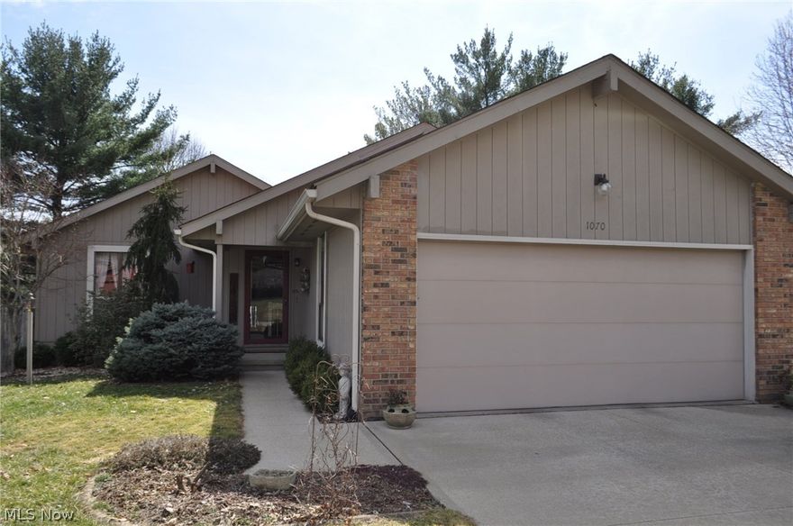 This beautiful~tastefully decorated~ home has three bedrooms and an office or could be fourth bedroom. A large dining room is an unexpected surprise with hardwood plank floors and door to deck.  There are three full baths.  Lower level full bath has been recently updated with tile flooring and new accessories.  Also in lower level is the third bedroom and big family room with sliding door to patio and fenced back yard. Gas log fireplace, cathedral ceiling, natural light portals, two car attached garage, concrete driveway, storage, deck and privacy fence~convenient location. Furnace less than 8 years old.