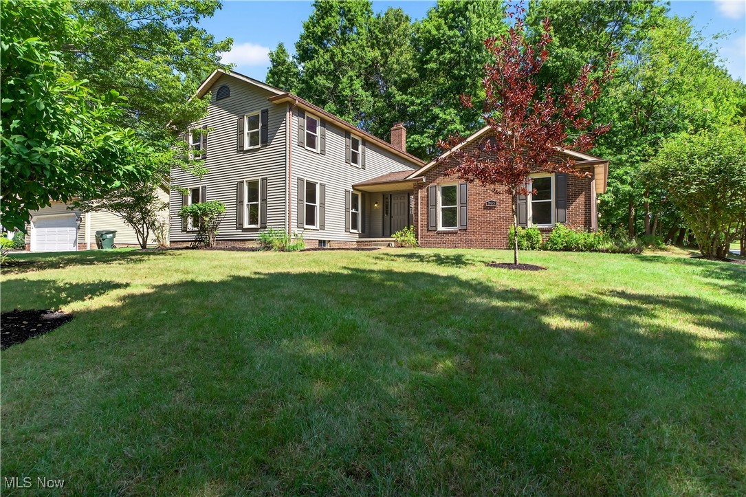 What an incredible home in an incredible neighborhood. IT JUST FEELS LIKE HOME. 4 bedroom, 2 1/2 bathroom updated Colonial in one of Stow's most desired neighborhoods. Beautiful curb appeal with a blend of brick and siding. A 2 car side load garage and a very well manicured lawn with mature trees and a very private backyard. Welcome your guest through the front door into the spacious entry featuring onto original hardwoods and crown molding. So much flexibility in this floor plan including formal living and dining rooms with large windows flooding the room with natural light. The updated kitchen is very large. You will be proud of the black leathered and honed quartz counters and new stainless steel appliances. Connected seamlessly to the spacious family room anchored by a classic wood burning fireplace. Direct access to the back yard onto the deck makes for perfect inside/outside living and entertaining. There is a completely newly updated half bathroom on the first level and a secluded and private 1st floor laundry space. Upstairs you will find 4 nicely sized bedrooms including a private master suite with vaulted ceilings and a bathroom with separate tub and shower. The lower level is also finished offering another finished hangout or play space and a potential 5th bedroom/guest room or office. There is another laundry option and plenty of storage. So many updates including all new flooring, paint. Updated lighting. New bathrooms and an updated kitchen. Nothing to do but move in!