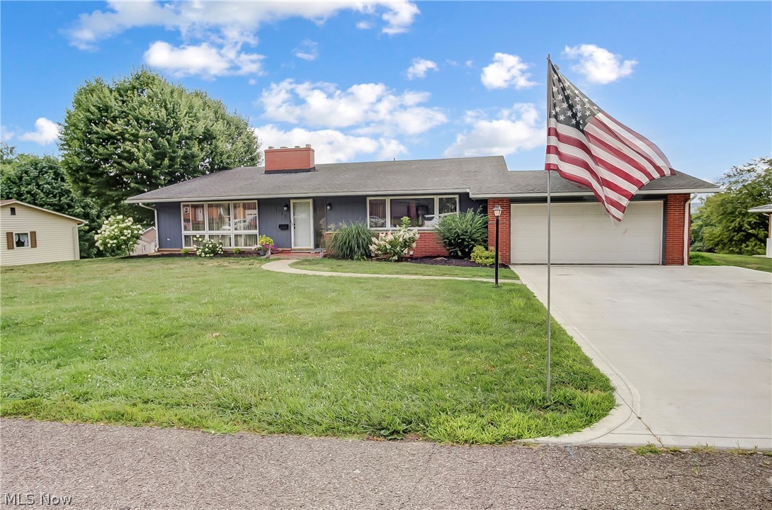Spacious 4-bedroom, 2.5-bath home featuring a new concrete driveway (2023) and updated landscaping. The interior boasts updated flooring and fresh paint throughout. The lower level offers a potential 5th bedroom or office, a wet bar and a half bath, in addition to the 4th bedroom & large family room. Enjoy newer kitchen appliances, a large walk-in tiled shower in the master bath, and added can lights. The kitchen has new countertops and freshly painted cabinets. Relax in the screened-in porch after a long day at work! The home also has new drywall by the fireplace, a new front door, and new closet doors. The guest bath upstairs is updated as well!