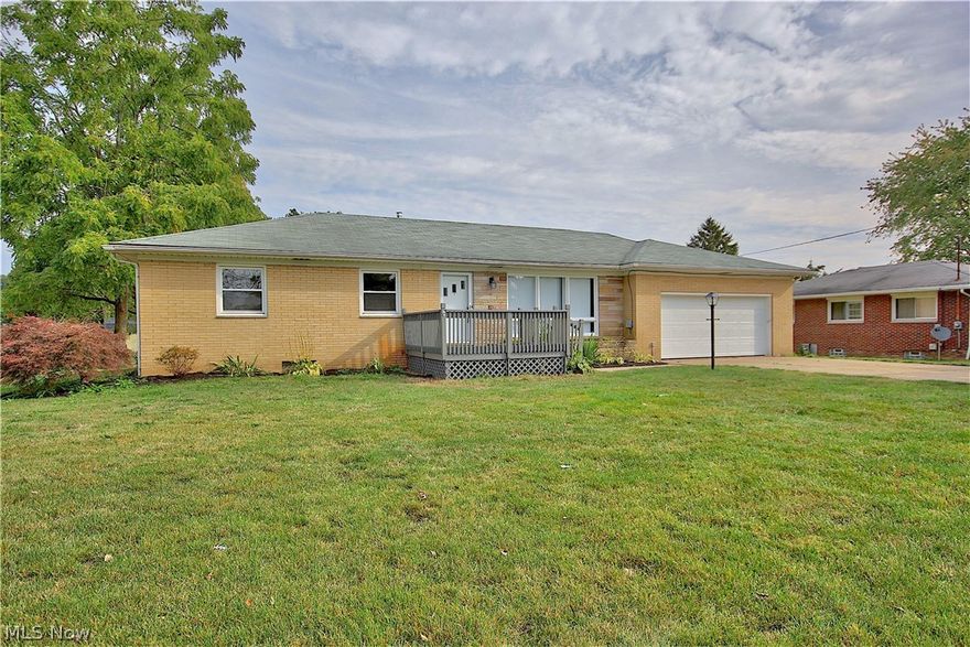 Welcome home to 567 W. Nimisila Rd! Beautifully renovated ranch in Manchester Local School district.  This home is 2 doors down from the high school and elementary school; 3 bedrooms and 2 full bathrooms; 2 car attached garage; large living room; gorgeous eat-in kitchen with granite countertops, stainless steel dishwasher and stove; awesome 3 season room that leads to large deck that overlooks the large back yard.  Brand new furnace/AC and water softener.  Don't miss this chance to buy a beautiful renovation in the Portage Lakes area.  Home is situated close to lake and reservoir activities, dining, and shopping.