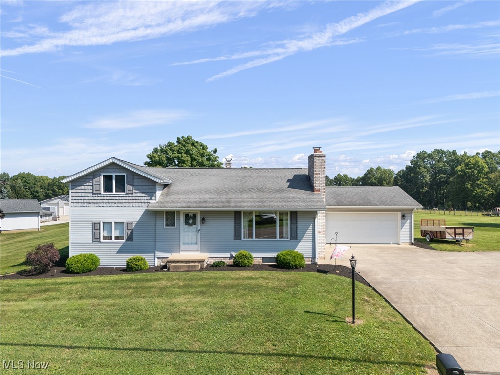 Pristine century home sitting gorgeously on three flat, open acres in Tuslaw. This home has been meticulously cared for over the years, and is ready for someone to call it their new home! Home features four nicely sized bedrooms, and 1.5 baths, first floor laundry, and a spacious kitchen and living room. Downstairs you will find an additional living space with a finished basement, and also plenty of room for storage. Do not miss the large attic, an added bonus space. Outside the view cannot be beat, and also the spacious outbuilding provides tons of additional garage space. Updates include: newer HVAC, siding, and more, this home is a must see!