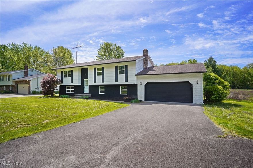 3740 Wilson Sharpsville Rd, Cortland, Ohio 44410 – Your dream home awaits! This stunning 5 bedrooms, 3 full bathrooms, single-family residence, completely renovated top-to-bottom, sits on a spacious 0.58-acre lot, blending luxury, functionality, and room to grow. Step into a bright, airy open-concept living space, perfect for modern living and effortless entertaining. The heart of the home is a gourmet kitchen featuring sleek black Stainless Steel Samsung appliances, gorgeous Quartz Countertops to prepare meals and set up buffet style serving, and an oversized island—ideal for breakfast, casual dining, sipping wine or hosting your friends and family. Enjoy abundant natural light through new windows and great installed modern lighting for energy efficiency. Luxury LVP Shaw flooring flows seamlessly throughout the home in a naturally light wood plank, adding warmth and durability. Each of the three full bathrooms is beautifully updated with stylish finishes, offering a spa-like retreat. with white tile, black fixtures and updated lighting and of course flooring and paint! Additional upgrades include a brand new, high-efficient HVAC system (furnace & central air conditioning) and a new electrical panel, ensuring peace of mind and energy efficiency. Outside, embrace the privacy and potential of your expansive 0.58-acre lot—perfect for outdoor entertaining, gardening, or adding a pool/playset. The rear deck off the kitchen & dining room is ready for grilling, entertaining or just your complete relaxation. Discover all-new finishes, new windows, designer paint colors, and gorgeous fixtures & lighting throughout this gorgeous home. Generously sized bedrooms and updated baths with contemporary fixtures seal the deal. Even the garage floor is epoxied! Don't miss this opportunity to own this beautiful Cortland home. Schedule your private appointment today! Authorized Signer/Seller is an Ohio Licensed Real Estate Agent. There are warranties on all the upgrades!