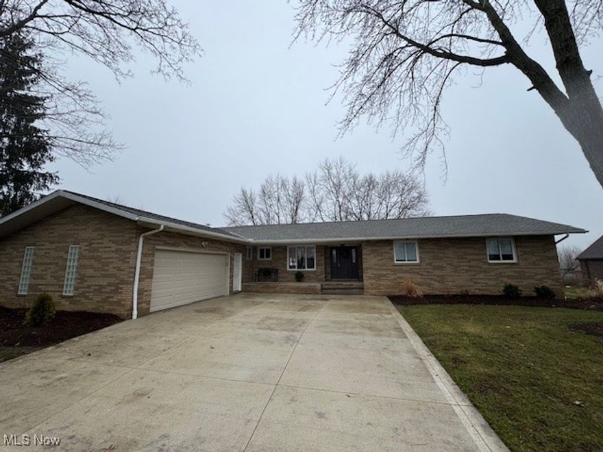 Do not miss out on this renovated ranch with over 4,000sf of space!  Large open floorplan with wood floors throughout most of the main floor.  All brick exterior. New roof.  Oversized driveway and garage.  1st floor laundry room.  Electric fireplace with feature wall in the family room.  New custom kitchen with 2-toned cabinets, granite counter tops and black stainless steel appliances.  Large finished basement with 2 recreation rooms and 2 large utility/workshop rooms.  New woodwork, flooring, bathrooms and much more.  Upgraded plumbing and electrical including a new electrical panel and plugs/switches.  Sunroom/4-seasons room with a sliding glass door to a large outside stamped concrete patio with privacy fences.  Large bay windows allow for large amounts of sunlight.  Property totals more than a half-acre with a wooded lot and storage shed.  Entire backyard is fenced in with an aluminum fence.