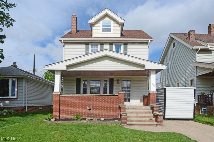 A Garfield Heights classic with hardwood floors, crown molding and a covered back porch! Spend your summers on the fabulous front porch. Enjoy the spacious living room which leads into the dining room, with beautiful built in cabinets in which to store your dishes and trinkets. Relax with a good book on the cozy bench seat. Freshly painted walls throughout the house. Spacious third floor bedroom recently redone. Updated bathroom with ceramic tile. Fenced yard with a two car garage. Make this your dream home!  Schedule a private showing today!