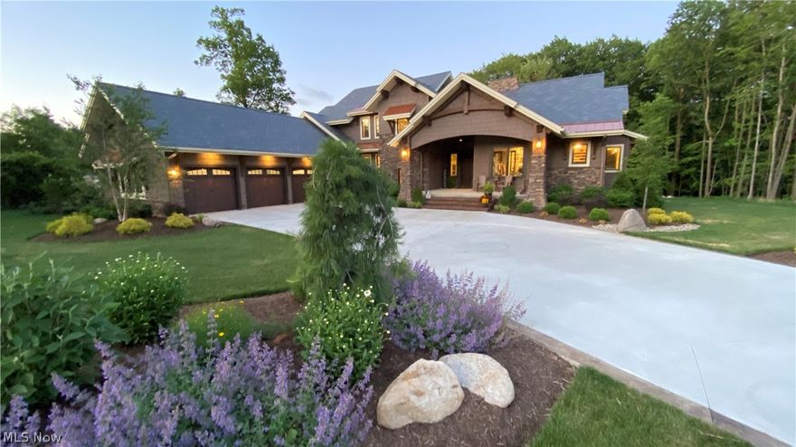 This quiet and blissful property is located in the Crystalbrooke Development of Hinckley just west on Mattingly Rd off Ridge Rd. The custom timber and stone home with the finest of finishes and appointments, including state of the art home automation and lutron homeworks lighting with palladiom keypad control, surveillance system, security and fire alarm, heated master bath floor, 2 high efficiency heating and cooling systems with 5 zones, closed cell foam insulation, precast concrete foundation from Superior Wall, engineered floor trusses, engineered slate roof, 2 hot water on demand systems with a manifold system, all high end appliances from Thermador including fridge/freezer, an induction cooktop and 2 double ovens, a butler's pantry, an office, an exercise room, a home theater, a fully finished walkout basement and stunning deck and hardscaped spaces from which to sit and view the visiting wildlife. Surrounded by a well wooded 2.035 acre lot, Whisper Bluff is a street with only a few custom built homes and it is located on a cul-de-sac. It is located in the peaceful Hinckley community not far from the Hinckley Reservation of the Cleveland Metroparks. It is a quick 20 minute drive to the Cleveland airport for work related travel. Located in Highland School District, one of the top systems in Northeast Ohio! State of the Art Home Automation with a THX Ultra II Dolby ATMOS Home Theater!