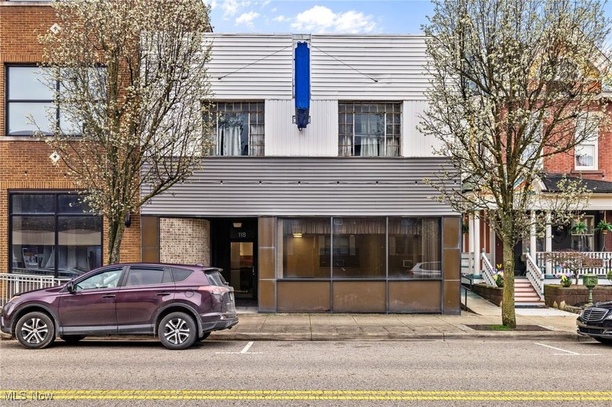 Amazing Opportunity to own prime office space in Downtown East Liverpool that is move in ready. Great views of 5th street with the large windows along the front of the building. The first floor boasts a large open concept office area measuring 75 x 29. There are two other offices as well as a large back room that could be a meeting or break room for staff, as well as an additional large back storage room. HVAC installed in 2020. 
Large open basement storage space. 
Looking for a project? Value Added opportunity on upstairs floor! The upstairs contains multiple areas that could be used for apartments or other commercial space. Office is vacant and immediate possession available.
Just under 3,000 sq ft each on main floor and upstairs. Basement is 3,416 sq ft.