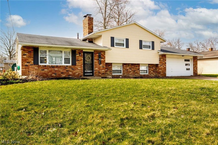 Beautifully updated home that is move-in ready!  Complete custom kitchen installed in 2016, featuring quartz countertops and slow-close drawers.  Luxury vinyl plank flooring installed throughout main and lower level, as well as in 2 of 3 bedrooms on upper level. Gas fireplace in main level living room installed in 2020.  Freshly remodeled 1/2 bath in lower level.  The spacious backyard includes a concrete patio and firepit area!  Don't wait on this one!