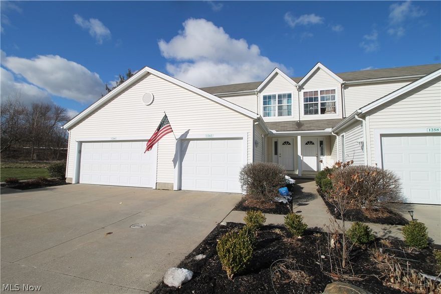 Bright and newly painted through out makes this 2 bedroom and 2 1/2 bath condo stunning. The beautiful open kitchen offers a new refrigerator, stove and dishwasher in 2017  and has neutral cabinets with a breakfast bar that overlooks the great room. Great room has new carpet 2017 and sliding glass doors that offers natural light and your own private patio which has a gorgeous meadow view.  Upstairs has two spacious bedrooms with walled closets, high vaulted ceilings and access to the full bath. Fabulous full finished lower level has new carpet 2017 and offers additional 400 square foot of living space which has an inviting family room and full bath for all your entertaining desires. Laundry room. Some more improvements are a new air conditioner in 2017 and a new sump pump in 2016. 2 car garage with new door opener 2016.
