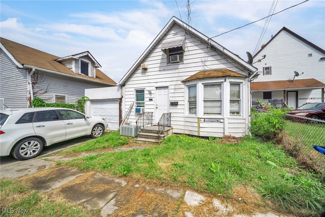 Quick! SHOWINGS COMMENCE SUNDAY, JULY 20 STARTING AT 12:00PM This 3BR, 1BA bungalow deserves a second chance and is priced accordingly. Ready for its curb appeal to be unleashed, this quaint century home features a first floor bedroom and oversized bath, formal dining and living rooms and a kitchen large enough to prepare Sunday dinners! Oversized attached garage needs attention, as does the lower level where the laundry hook ups are located. Great opportunity for a cash buyer who relishes a challenge in a convenient location less than 10 minutes to downtown Cleveland! For those averse to yard work, you will appreciate the ultra-petite .04 acre lot! No appliances convey with this property. Foreclosure just filed, but lender is in communication with the listing agents daily and will lift foreclosure proceedings for an acceptable offer. This property IS OCCUPIED BY THE OWNERS. Appointment is required and the buyer's agent MUST ACCOMPANY their clients for each and every showing. CASH ONLY.