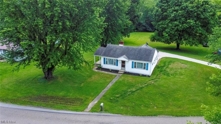 This charming, single story home in Amsterdam, Ohio is turn key; ready for you to move right in and add your finishing touches! Built in 1955, this meticulously cared for property offers a cozy and inviting atmosphere. As you step inside, you'll immediately notice the attention to detail and pride of ownership that has been poured into this home. Featuring two spacious bedrooms, one full bath, eat in kitchen, and living room. The large windows throughout flood the rooms with natural light, creating a warm and inviting ambiance. The immaculate condition of this home extends beyond its interior. Step outside onto the large flat yard, perfect for outdoor activities, gardening, or simply enjoying the fresh air. The one-car garage provides convenient parking and additional storage space, while the shed offers even more room for your tools and equipment. Located in a peaceful neighborhood, this property offers a serene and tranquil setting, ideal for those seeking a quiet retreat. Don't miss