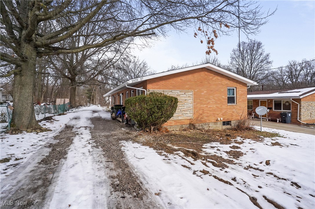 Great investment opportunity for an all brick ranch duplex! Two bedrooms, 1 bath and separate basement on each side! Many updates to include new roof, insulation and sewer line (2024).
Unit 2427 (Back) - has been totally renovated in 2024/2025 to include new kitchen, bath, furnace, flooring, paint. Hot water tank - 2022
Unit 2425 - offers hardwood floors and new furnace in 2023.