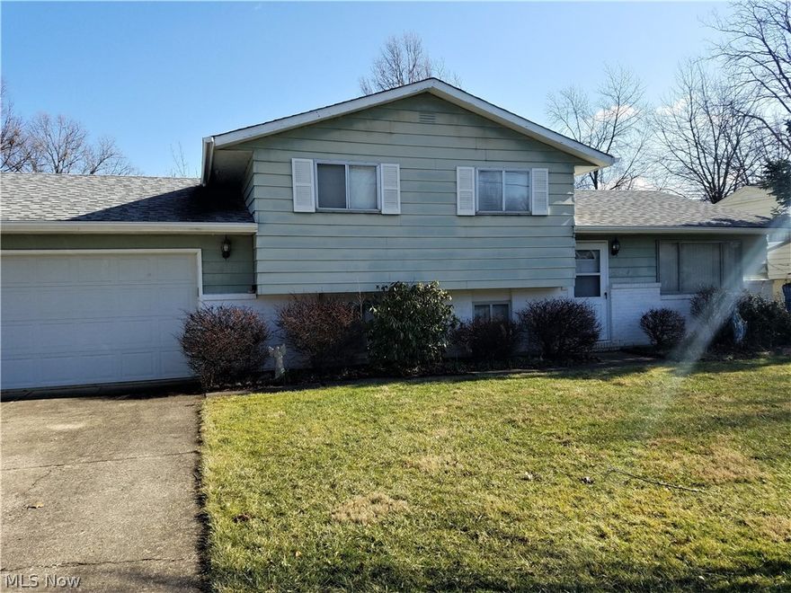 Come view a fantastic opportunity in North Ridgeville! Very solid split level; 3 bedrooms and 2 full baths. Great floor plan with large formal LR opening up to just a few stairs to go up or down, then into DR and kitchen. Light and bright with sliding doors to patio off the DR. Large kitchen with lots of counter space and slow close cabinets (new in 2008). Add a family room in the Lower level with brand new neutral carpet. EZ access to laundry room with another full bath. Dont miss the shower hidden behind the door! The Furnace and A/C just checked in 2019. Newer roof, newer garage door and new gutters in 2019. Huge backyard with chain link fence. 2 car oversized garage. This is a lovely home just waiting for its new family!