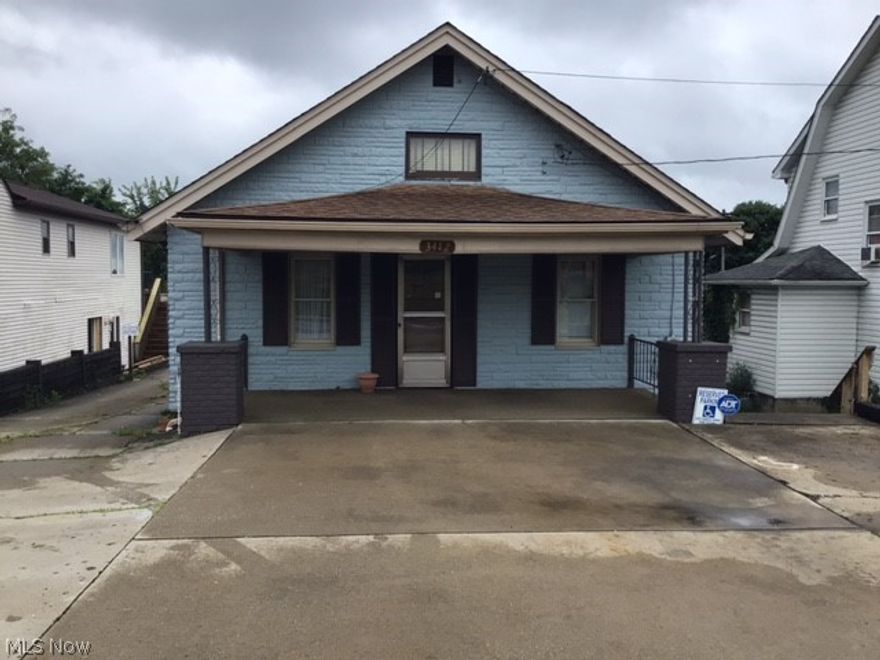 Looking for the perfect location for a small business? Look no further! This high traffic property is move in ready with easy access, plenty of parking, kitchen and   bath if needed. Hardwood floors, full walkout lower level, side entrance.   Call today for your private tour.