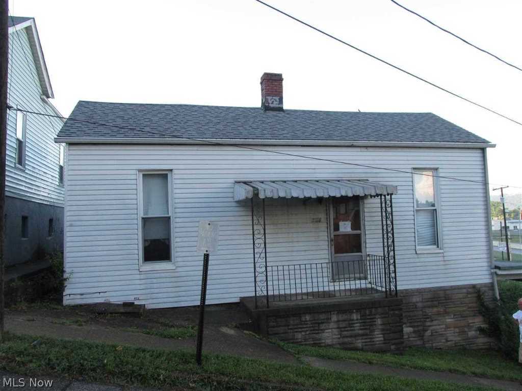 Aluminum sided 2 bedroom, 1 bath home located close to St Rt 7, north to south. Home needs TLC.