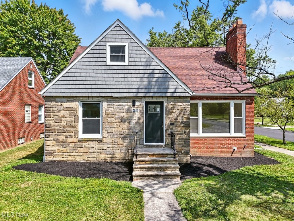 Experience the ideal blend of charm and modern updates in this beautiful fully remodeled Cape Cod-style home. Upon entering, you're welcomed into a bright and inviting front room where a large window fills the space with natural light. The family room offers a charming fireplace, creating a warm and inviting ambiance perfect for unwinding after a long day. The updated kitchen is equipped with brand-new appliances and enhanced by sleek recessed lighting, making it both stylish and functional. On the main level, you’ll find two inviting bedrooms, a full bathroom with a large storage cabinet, and a hall linen closet for convenience. Just off the dining area, step into the enclosed porch—an ideal space for morning coffee or quiet reading. The patio opens to a private deck, perfect for outdoor dining or relaxing in the fresh air. Upstairs, you'll find a spacious and private primary suite that offers the perfect retreat, complete with a large walk-in closet and a beautifully appointed full bathroom featuring a luxurious double shower. The finished basement provides generous space for a recreation room, home office, or extra storage. Enjoy the security of a new AC unit, new water heater and a waterproofed basement. A two-car garage completes the home, offering both convenience and more storage. This beautiful remodeled, move in ready home is a must see. Don’t miss out!