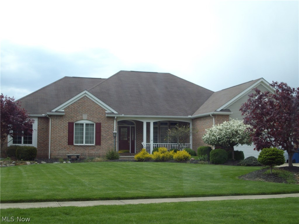 This is a one owner meticulously kept Ranch in Austin Estates Barberton is one of a kind. You will enter from a manicured yard to a lovely front porch and into a large tiled Foyer an open Great Room with Cathedral ceiling, Brick fireplace, two skylight enter into a dramatic dining room with double crown Oak molding and square Oak pillars separating the area. this home offers two full baths, three bedrooms, tested ceiling in the morning large Master Suite, two walk in closets, double sinks Jetted tub, separate shower and commode area. The home offers Oak Trim and six panel Oak doors throughout, the kitchen has Granite counter tops , large center Island, Stainless Steel appliances stay Plank laminate flooring, Pantry, stunning brick fireplace in the Bayed Breakfast dinette, Double Oak Crown Molding and walk out to oversized deck overlooking a lovely back yard. There is a convenient first floor laundry off kitchen, an unfinished basement for you to finish as you like with third bath p