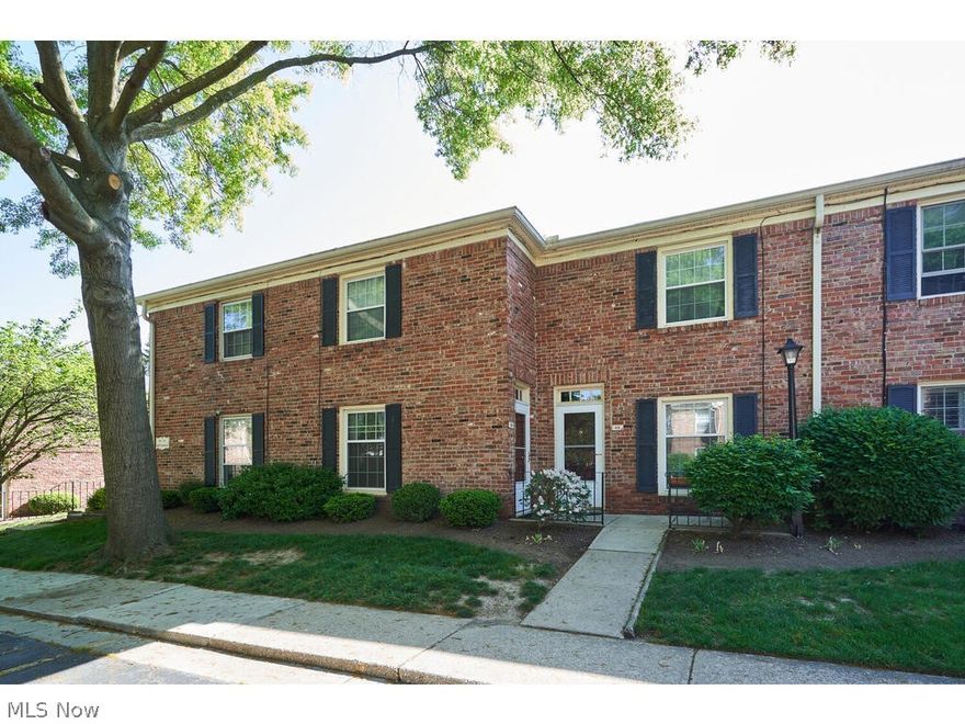 Coveted Georgetown location! Cozy 2BR 1.5BA  townhouse w/ patio overlooking Portage Country Club's driving range and golf course! Open 1st floor with living room, white & light eat-in kitchen w/ newer slider to private paver patio, and half bath. Just upstairs are the master & guest bedrooms, full bath, and full size washer & dryer closet. Vinyl windows, AC '21, new storm door, plus the washer and dryer stay. Enjoy swim & tennis as well as a leasable community room/space at Georgetown! Conveniently located adjacent to Portage Country Club, less than 1 mi from Highland Square, 5-min drive to I-77 & downtown Akron, and a 10-min drive to Fairlawn Shopping / Dining.