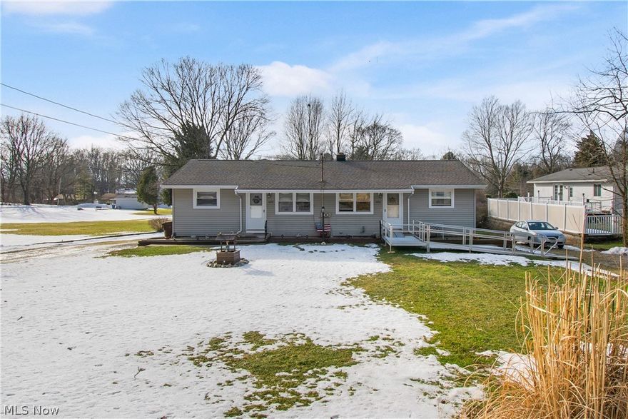 This wonderful two unit is larger than it appears.  First unit has spacious open floor plan great room, kitchen and dining area. Two bedrooms, bath, formal living room on main floor. Lower level has laundry and partially finished rec room plus large storage area.
2nd unit has two bedrooms, kitchen w/eating area, living room plus two full baths. One on first floor and one in lower level with partially finished basement and storage area.  First unit has deck off great room and detached 2 car garage. Second unit has walk out to detached 1 car garage.  Owner occupied in both units.