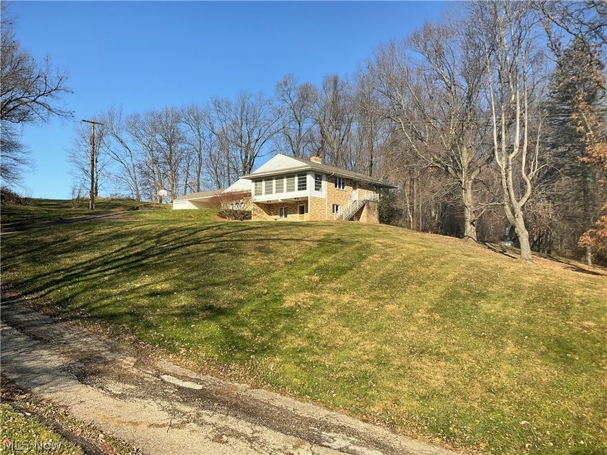 Beautiful country living with a view! Steep driveway (4 wheel drive recommended for winter time). Come relax in this three bedroom two bath brick ranch. The kitchen and bathroom are freshly remodeled! Spend cold winter days in the cozy living room by the fireplace and relax in the three season sunroom. Also a back patio perfect for BBQ’s. No Pets