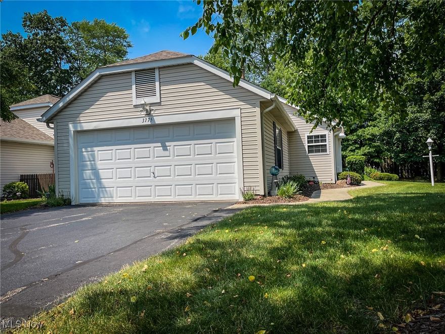 Stunning condo at popular Woodbury in Stow. One floor living at it's finest! This condo has two bedrooms and two full bathrooms, a great room with a large formal dining area, a gas fireplace, a fully applianced kitchen, and a first floor laundry AND a 4-season sun room! There is so much to love about this condo! The kitchen has been updated with Corian counters, stainless steel appl, built-in oven and M/W oven, and LVF. The kitchen also features an eating area, a window seat, and an abundance of cupboards! See the pictures! The great room features a vaulted ceiling, a gas fireplace, a fan, and sliders to the 4-season sun room! The master bedroom is large and has a fan with light, and an en-suite bathroom. The master bathroom has a step-in shower and a walk-in closet. The 2nd bedroom is located just steps from the main bath and features a fan/light and a walk-in closet. The first floor laundry is accessed through the garage and includes the washer and dryer, an abundance of cabinets for storage, as well as another closet. There are updates through-out. Many custom blinds, furnace and A/C, H20, all newer SS appl in kitchen, Luxury Vinyl Flooring in kitchen and hall, painted thru-out, and Nature Stone floors in the garage and front porch.  It is located with-in a mile of shopping (Giant Eagle, Meijer, Aldi, and Acme grocery stores). Several restaurants and fast food places, and shopping areas like Target, Home Goods, Kohl's, Hobby Lobby, two dollar stores, Carters, and so much more! This condo is priced to sell and the owner is offering a one-year home warranty for the buyer's comfort. Do not wait - call for your appt today!