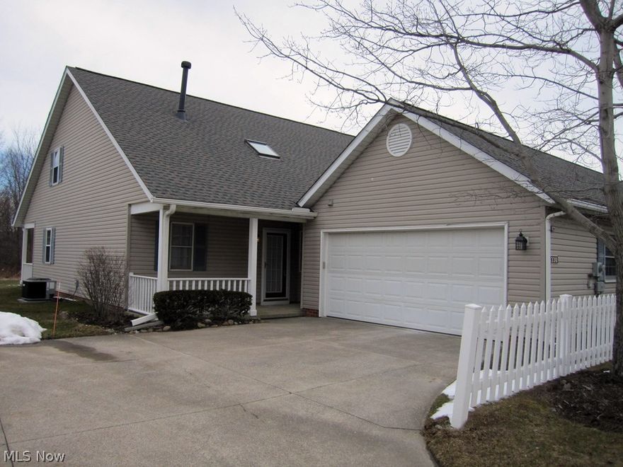 Completely updated Macintosh Farms Condo in prime location with wooded views. This end unit offers 1st floor Master Bedroom, 2 story Foyer and staircase, 2 car attached garage in a community with pool, tennis courts, trails, clubhouse and quick access to highways leading to Cleveland and Akron. This spacious home features updates galore to include Eat-in Kitchen with new Stainless Appliances, striking black granite counters and working center island. Open Dining and Living Rooms have beautiful new wood laminate flooring and there's a painted brick gas log fireplace in the living room and Sliders to a covered patio. All 3 spacious Bedrooms, stairway and upper hall received quality plush carpeting in a fashionable neutral color. The entire interior has been professionally repainted in gorgeous neutral color, most lighting fixtures have also been replaced. New Furnace & Central Air in 2017. There really is nothing to here other than "move in" and enjoy all that this Southern Cuyahoga Coun