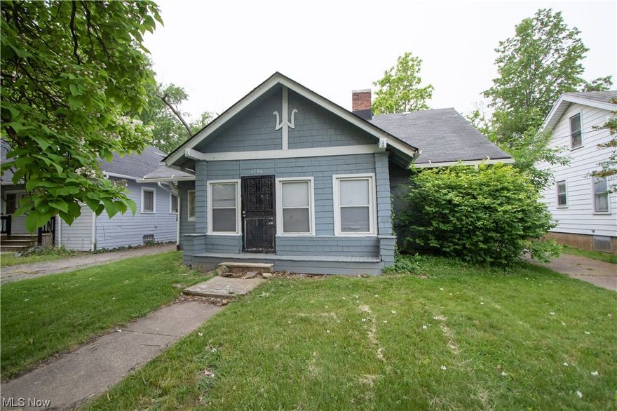 4 bedroom, 1 bath bungalow ready for new owners! Come and make this home your own or add this gem to your investment portfolio! This home features beautiful hardwood floors, a cozy fireplace and an updated kitchen. 2 bedrooms on the main floor and 2 bedrooms upstairs. Out back you will find a detached 2 car garage and a fenced in backyard. Schedule your tour today!