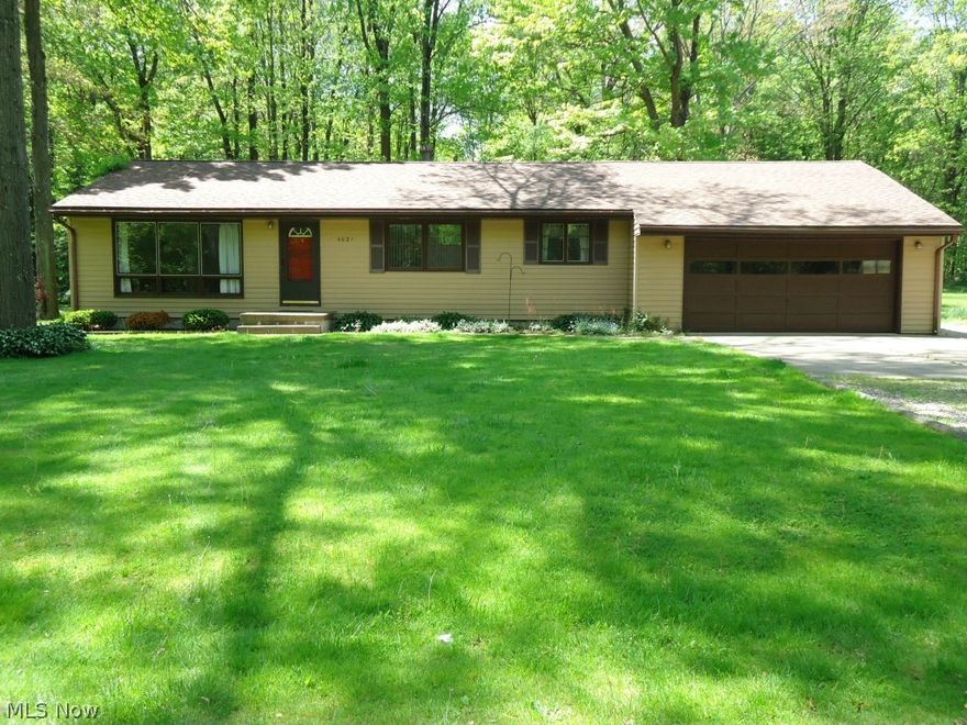 Nice Ranch! Unusual privacy with a large wooded lot in a quiet park-like setting. Close to Green schools. Low traffic cul-de-sac street. Full finished basement. A must see not a drive by.