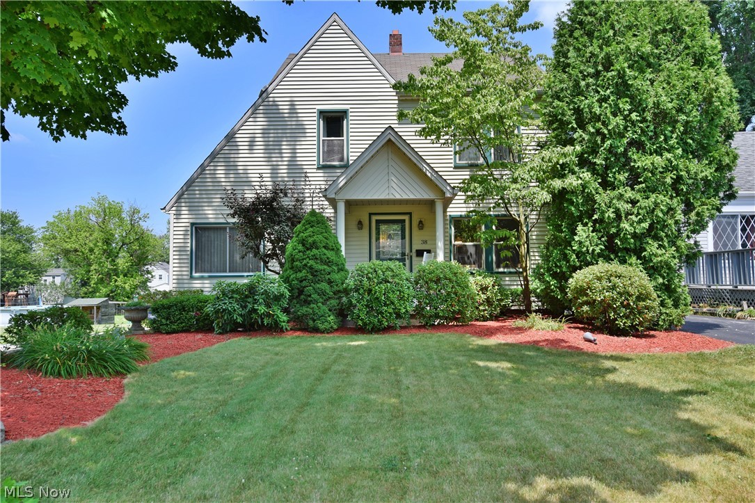 This exceptional cape cod is hot on the market with its stylishly good looks and spacious, well-kept living space! You’ll quickly fall in love with the wonderfully landscaped exterior that takes the curb appeal of this residence to the next level. Enjoy the relaxing side patio or leisure in the deep-set, fenced in back yard. Inside, a covered front entry leads to a welcoming living room where a prominent stone fireplace takes centerfold amongst the hardwood styled flooring. Windows line the front of the home to include the bonus, side office space or reading nook. Sculpted archways lead into the robust dining room where rich wood trim work follows down from the wrapping chair rail. The sun-filled family room waits nearby while you make your way into the kitchen. Here, a formidable layout includes tons of countertop space that extends into the formal dining area as French doors provide backyard access. Tiled flooring fills the room to accent the updated stainless appliances and lavish w