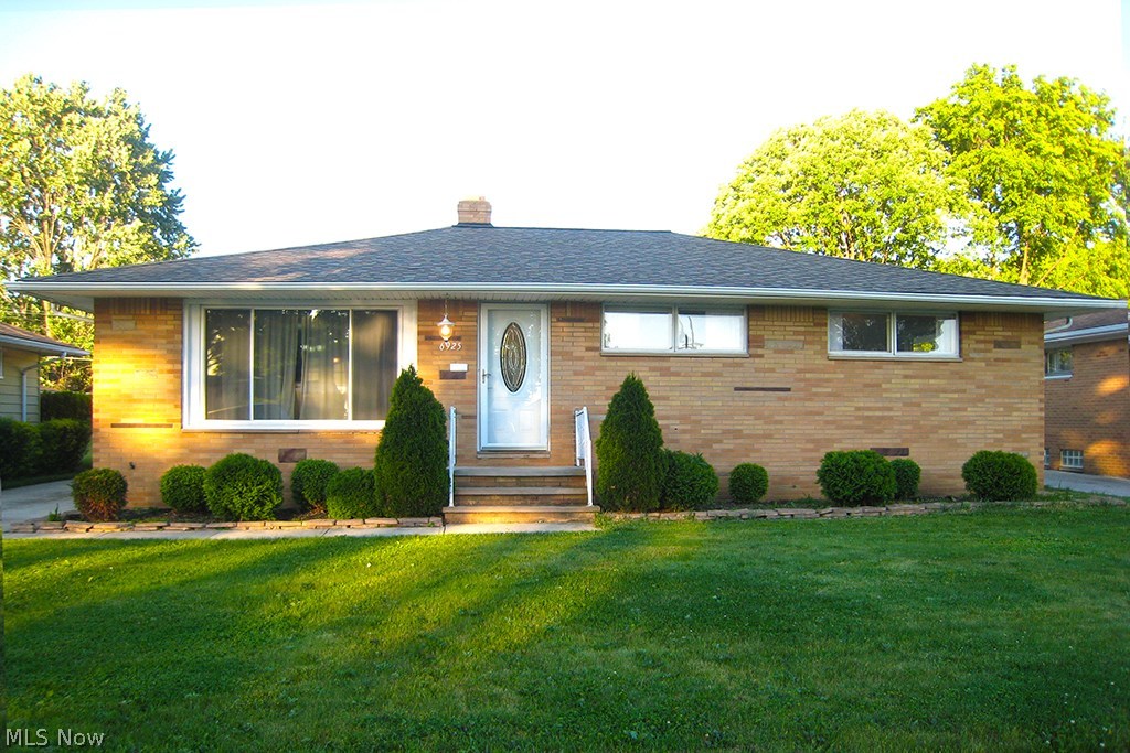 Say Hello to Home in this 3 bedroom, 1.5 bath ranch with 1,290 square feet! The house boasts beautiful natural light, hardwood floors, and updates throughout. The kitchen is large, bright and airy, with ceramic tile, newer appliances that stay and newer kitchen cabinets. Beautiful hardwood runs through all of the other rooms, including the large family room and separate dinning area. Each bedroom features an oversized closet with new mirrored sliding doors. Bedrooms are large with ample light. The dinning room leads to the private backyard patio and eating area through two french doors. The back yard is fully enclosed by a 6 foot privacy fence. The oversized 2.5 car garage is fully insulated with an attached shed. Updates include: Insulation, siding and gutters in 2009, hot water tank in 2010, new roof in 2006, furnace and ac in 2013, new doors and fixtures throughout home. HOME WARRANTY INCLUDED! Stop by today to see this beautiful single floor home in Parma Heights.