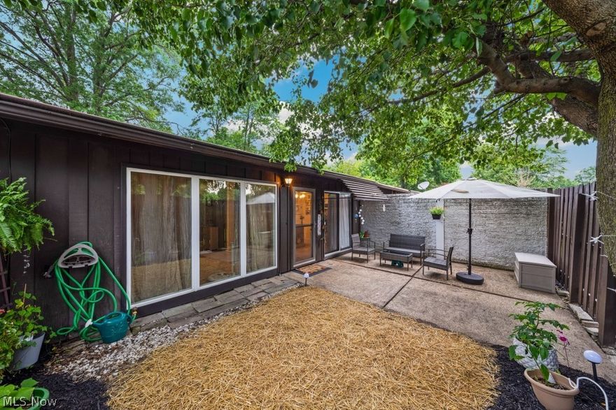 Welcome to this remarkable two-bedroom ranch-style cluster home nestled in the quaint city of Berea. This low-maintenance home combines convenience and affordability in a charming setting. From the moment you arrive on Greenfield, you will be captivated by its appeal. This unit features a private carport with an adjoining storage unit, leading to your fully fenced-in terrace. Upon entering, you'll be greeted by an abundance of natural light and an open floor plan. The generously sized eat-in kitchen overlooks the large living room, creating the perfect space for entertaining or a relaxing evening at home. Down the hall, you'll find two spacious bedrooms with ample closet space. The owner's room features a walk-in closet and its own private patio, accessible through a sliding glass door. The tastefully updated full bathroom includes ensuite laundry for added convenience. Located within a short distance to shops, Metroparks, the airport, and freeway access, this home offers both comfort and practicality. Seller is including a one year home warranty for added peace of mind!