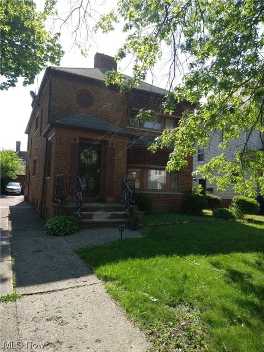 Upper Larchmere area, 5x5, Brick solid 2 family with 3 car garage. Air conditioning in both units. great rental property or rent one, live in the other. 
No inside showings until accepted offer. Please do not disturb the long time tenants. Drive by only! Please do your due diligence for rent rates for the area. newer furnaces and hot water tanks. Good roof. Basement is a rec room with 1/2 bath and a laundry area.  Paved drive way, Enclosed sun porch on each unit. No 3rd floor. Walking distance to shopping.