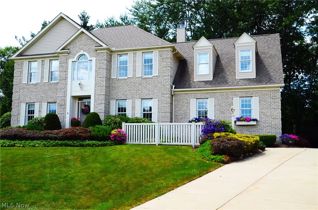 Custom Built 4-bedroom on a Cul De Sac in Regency Park in Tallmadge. Open Kitchen updated with quartz countertops with bar seating, Stainless Appliances and plenty of cabinets. Family room features a Fireplace flanked by built-in bookshelves with plenty of windows overlooking the partially wooded back yard. Sunken formal living room with crown molding, dining room with crown molding and a tray ceiling. Master bedroom suite also has an adjacent 10' x 12' sitting room with a fireplace and a bench seat built in below the window. 705 sf of finished space in the basement for entertaining. Outside, enjoy a spacious deck and brick patio. Hurry this one won't last.