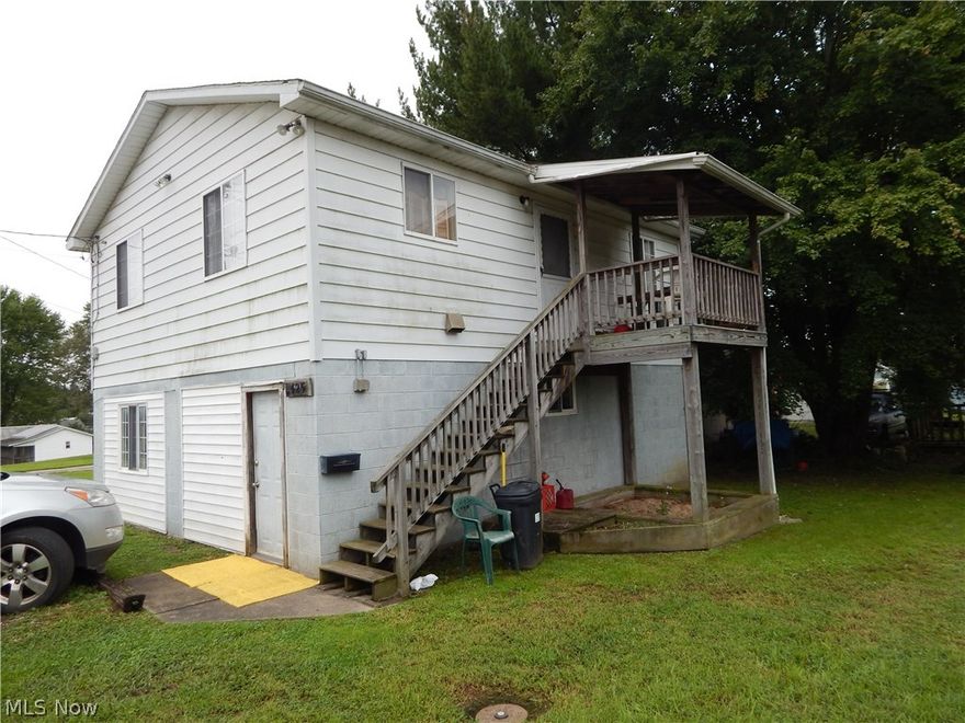 LOW MAINTENANCE ON MARYLAND AVENUE!
This two bedroom, 1 bath home sits on a level lot in Harrisville! The first level has a bedroom, a Large rec room and a bonus room that could be used for a third bedroom, if needed! On the second level, there is an open kitchen/dining/living area with newer laminate flooring, another bedroom and a full bath.  A deck and a porch provide room for grilling & relaxing outside.  Call for details!