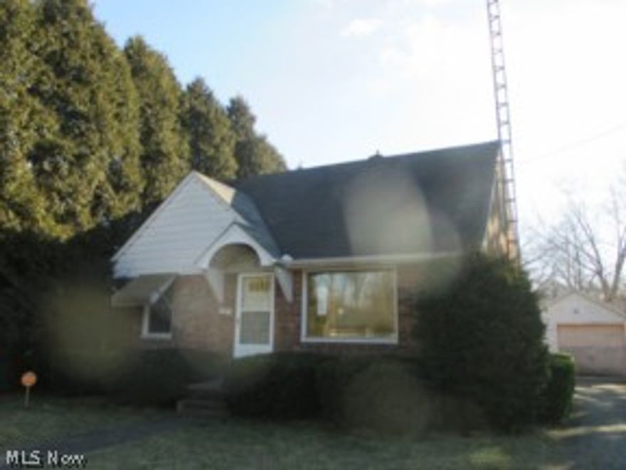 3 bedroom brick home sits right across the street from the school.  2nd floor bedroom is knotty pine paneling and so is the rec room in the basement.  Cute starter home with lots of storage room.