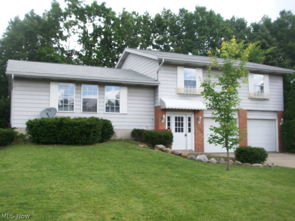 A remarkable split level in Sherwood Acres. This 4 bedroom 2.5 bath home has over 2600 square feet of total living area. The basement is finished with a 21x15 rec room, additional bonus room, and finished laundry room. The family room has a fireplace, and opens to the private back yard. The new kitchen has granite counter tops and ceramic floors. The flooring throughout the home is new. The many interior updates include: carpet, ceramic, fixtures, paint, 1/2 bath, electric, and much more.