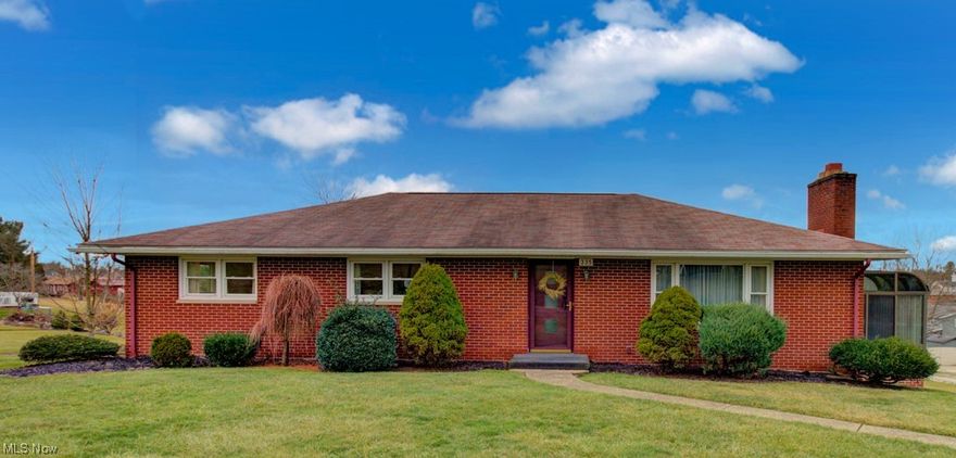 IMMACULATE CONDITION with IMMEDIATE POSSESSION in this fabulous brick ranch home situated on 2 large lots in town! Owners have taken pride in maintaining. Add your own personal updating to make this great home your own personal haven!  Super spacious rooms! You'll love the extra large living room with gas fireplace plus the sizable dining room for hosting family and friends! 3 bedrooms and 2 full bathrooms on the main level. Enjoy your morning coffee soaking up the sun, in the first level, 4 season sunroom addition in 2007. Other updates include: windows 2005, hot water heater 2024, hot water boiler system 2022, whole house A/C in 1997, and roof in 2012. The partially walk-out lower level offers a canning kitchen, additional finished room and 1/2 bath with shower. There's a one car garage under the house and a 22 x 24, 2 car detached garage out back.  Very reasonable utilities with a 2022 12 month average electric bill at $97 and 12 month average gas bill $153.00.