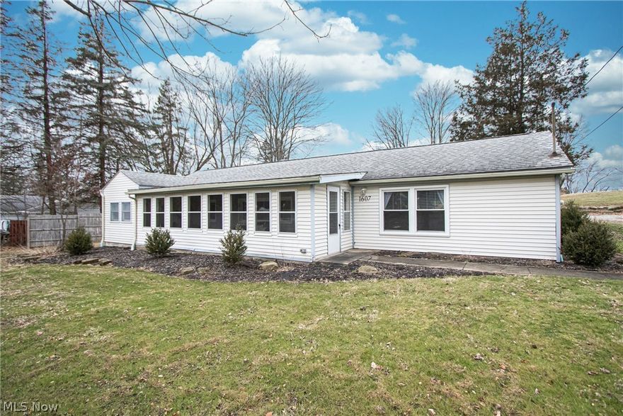 Don't miss out on this beautiful move-in ready home in Green local school district! Sitting on just over an acre of land, this ranch has a desirable open floor plan featuring an updated kitchen with granite countertops, newer carpet in all the bedrooms, and a spacious covered front porch with tons of natural sunlight, perfect for any season. This home also includes a large 2-car garage that features a great storage/workshop area. Additional details include:*Furnace-2018 *A/C - 2018 *Interior and Exterior Doors - 2018 *Roof-2018 *Electrical Panel - 2018. Finally, a new 2018 water system has been installed that includes a new well pump, brine tank, and a self-cleaning filter system!!