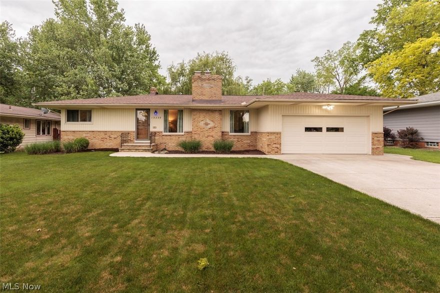Looking for a Move-In Ready Home, Your Search May be Over! Situated in Desirable Indian Creek Estates, this Impeccable Ranch Home is as Clean as it Gets! Featuring 3 Bedrooms with 1.5 Baths on the First Floor and Living Room with Fireplace & Hardwood Floors Open to the Dining Room. Full Basement Offers a Finished 40x13 Rec room with Fireplace, Laundry Area, Full Bath and Plenty of Storage. Rear Covered Porch with Ceramic Floor overlooks an Awesome Fenced Backyard with a Beautiful Park Like Setting and Gorgeous Landscaping!  Large 2 Car Attached Garage with Nature Stone Floor, Extra Wide Driveway and New Roof in 2025. Conveniently Located near the Metroparks, Walking Trails, Rec Center, Library and Shopping.  Home Warranty Included! This Home is a Must See!