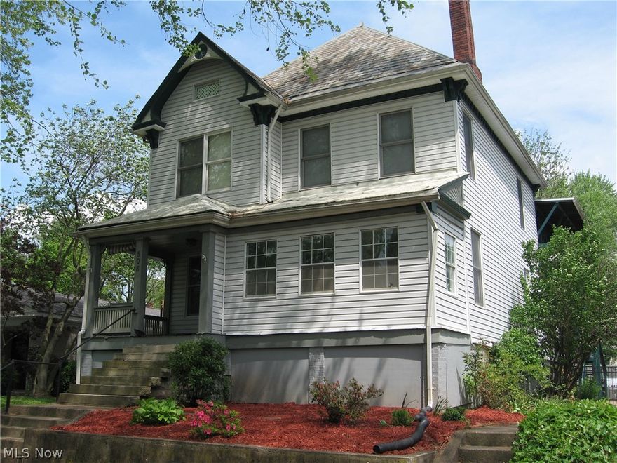 This charming and spacious home sits on the site of the Old Marietta Button Factory.  The home offers beautiful original woodwork and wood trim, new flooring including pergo and ceramic tile, a master bath with a whirlpool tub, double sinks, separate shower, covered deck off master bedroom, large first floor laundry and mudroom, large usable basement, storage building, newer heating and air conditioner systems, windows, plumbing and wiring.  Home is wired for a generator (generator not included).  It has gas forced air heating system and central cooling.  Double carport, off street parking, alley access and large yard.  So much more.