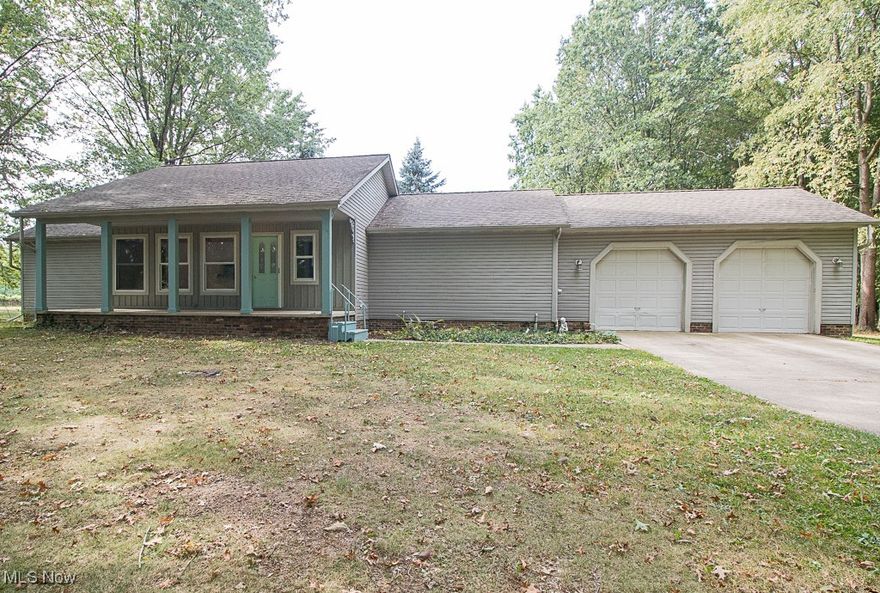 Would you be interested in 3.88 Acres of Seclusion within Painesville City? This rare find Spacious open floor plan Ranch features Privacy sitting behind a 24 x 90 White cinder block Building with a man door & standard overhead garage door leads to a Heated workshop area with 220 Electric. On the North Side of the Block Building is a 20-foot Overhead Door that leads to a Vaulted gravel/dirt floor area. Drive around the white building to a park-like paradise! Natural Light illuminates the vaulted Great room leading into Eat In Kitchen with island. This split Ranch with two Bedrooms features walk-in closets as well as Private full bath access. Full Basement. Two-car attached garage. Rear Deck overlooks the beautiful yard featuring wildlife visitors..wild turkey and deer. Convenient access to shopping, restaurants, and freeways.