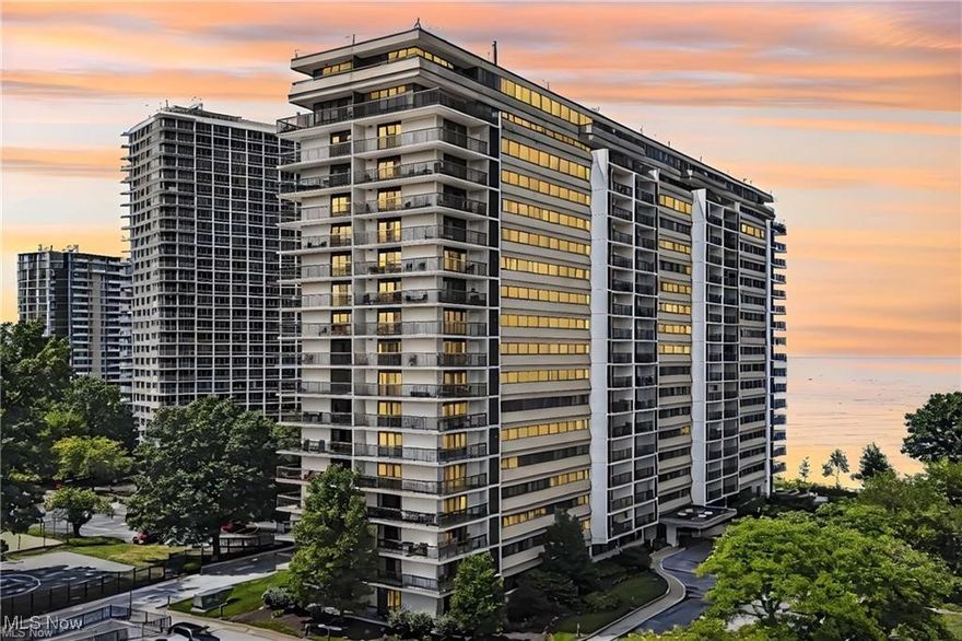 Welcome to 12550 Lake Avenue #1512, a stunning corner unit with a wraparound balcony showcasing sweeping views of the lake. The balcony is the perfect spot to enjoy your morning coffee while watching the sunrise or to wind down in the evening with the calming water as your backdrop. Step inside to find a newly renovated interior with dark wood cabinets contrasted by bright quartz counters, a double-sided sink, breakfast bar, and stainless steel appliances in the kitchen. The formal dining area overlooks the water and flows seamlessly into the spacious living room, where large windows flood the space with natural light and highlight the incredible views from nearly every angle. Down the hall, you’ll find two generously sized bedrooms and two updated bathrooms, offering comfort and privacy. Another added bonus is a generously sized walk in closet/pantry with power in the entry so you can add a mini fridge or other appliance. Fresh upgrades include new flooring, doors, and light fixtures throughout, adding modern style and convenience. This move-in ready unit is complemented by a deeded tandem parking space (137), storage locker (1512), and access to a wide range of amenities: indoor and outdoor pools, fitness center, hot tub, game room, library, party room, gas grill, picnic tables, and a dog run. With condo fees covering all utilities except electric and internet, this lakefront home blends modern upgrades, functional living, and resort-style community amenities into one extraordinary package.