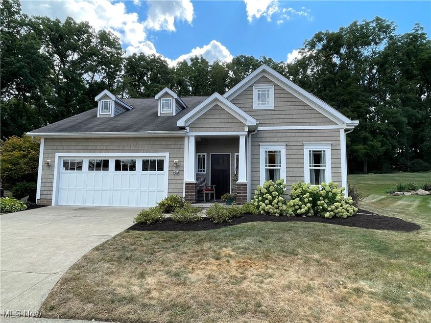 Stunning custom-built Villa style stand alone condo in Mudbrook Village. This home is in a premium location and has a gorgeous expansive park-like yard that backs up to woods for privacy. The open-concept layout features an eat-in-kitchen, formal dining, living room with gas fireplace and trayed ceiling, a den/family room, and a vaulted 4-season's sunroom. The master suite has a bath with a large shower, walk-in closet, and a beautiful view of the back yard. Upstairs you will find the second bedroom with a walk-in closet, as well as a huge storage/utility room which could easily become more space if needed or a third bedroom. You will love the custom features that were added to this home like 9' ceilings, an abundance of windows to let light in, lots of trim work and crown mouldings, and a patio out back. The garage is over-sized with an area for hobbies or tools. Better check this one out!